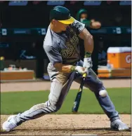  ?? CRAIG LASSIG — THE ASSOCIATED PRESS ?? The Athletics’ Matt Chapman, who is battling inconsiste­ncy, had a three-hit game on Sunday against the Twins.