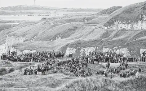  ?? Stuart Franklin / Getty Images ?? Rory McIlroy said it’s “sort of strange to see” the world’s top players playing at Royal Portrush Golf Club in his native Northern Ireland.