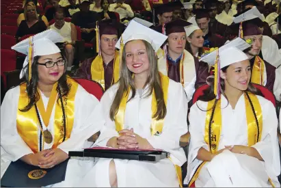  ?? Photos by Joseph B. Nadeau ?? Above: Enjoying a productive Woonsocket High School Senior Awards night were, from left, Class Valedictor­ian Kelley Babphavong, Sabrina Abramek and Elizabeth DiTommasso. Behind them are Matt Letourneau, Taylor Gray and Evan Bartholomy. Below: Bruce...