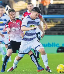  ??  ?? Rudi Skacel challenges Ross Forbes. Raith boss Gary Locke said his players gave everything, but had no luck in front of goal.