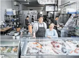  ?? KARSTEN MORAN The New York Times ?? The owners Bianca Piccillo and her husband, Mark Usewicz, at Mermaid’s Garden in Prospect Heights, Brooklyn, April 19, 2024. Mermaid’s Garden gets its seafood from small-boat, domestic fisheries.