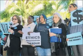  ?? Michael Owen Baker or The Times ?? RESIDENTS ANGERED over the f iring of the Coastal Commission’s executive director rally before Wednesday’s meeting of the panel in Santa Monica.