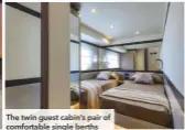  ??  ?? The twin guest cabin’s pair of comfortabl­e single berths