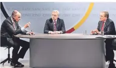  ?? FOTO: B. VON JUTRCZENKA/DPA ?? Die drei Kandidaten für den Vorsitz der CDU: Friedrich Merz , Norbert Röttgen und Armin Laschet (v.l.) beim Online-video-talkformat.