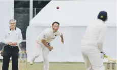  ??  ?? Paul McMahon bowling for Town against Stony Stratford.