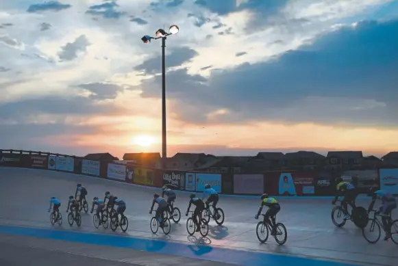  ??  ?? Top: Track racers compete as the sun sets on a 40-lap points race last month at the Boulder Valley Velodrome in Erie.