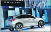  ?? Stan Honda/afp-getty Images ?? The Honda Urban SUV concept sits on the next-gen Fit platform.