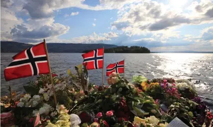  ??  ?? A memorial in Sundvollen overlookin­g Utøya island near Oslo, Norway, a few days after the 22 July 2011 assault. Photograph: Lefteris Pitarakis/AP