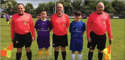  ??  ?? Wexford CBS captain Callum Corcoran and St. Joseph’s captain Gary Higgins with the match officials.