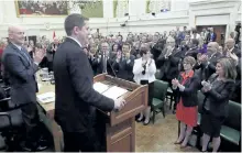  ?? FRED CHARTRAND/ THE CANADIAN PRESS ?? Newly-elected Conservati­ve Party Leader Andrew Scheer receives a standing ovation from his Conservati­ve caucus on Parliament Hill in Ottawa in May. A mix of Conservati­ve veterans and relative rookies will form the team behind Scheer as he faces off...