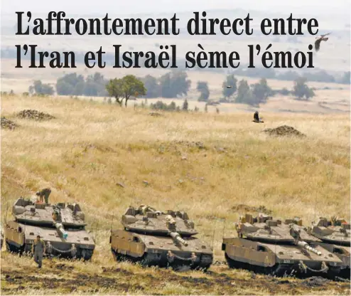  ?? MENAHEM KAHANA AGENCE FRANCE-PRESSE ?? Des tanks de l’armée israélienn­e sont massés à la frontière avec la Syrie sur le plateau du Golan.