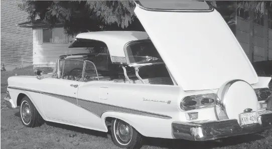  ??  ALYN EDWARDS/DRIVING ?? The author’s ’58 Ford Skyliner retractabl­e hardtop, with Continenta­l spare tire, is similar to the customized one he first fell in love with in high school in Toronto.