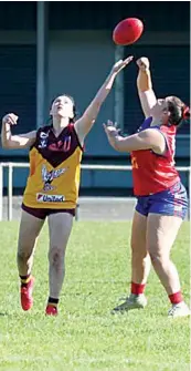  ?? ?? Drouin player Olivia Douglas is about to tap the ball out to a teammate.