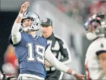  ?? AP ?? WORST FOOT FORWARD: Cowboys kicker Brett Maher watches one of his NFL record four extra-point misses in the team’s wild-card victory over Tampa Bay on Monday.