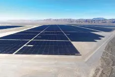  ?? Las Vegas Review-Journal via AP ?? ■ Solar arrays line the desert floor of the Dry Lake Solar Energy Zone on Dec. 11, 2017, as part of the 179 megawatt Switch Station 1 and Switch Station 2 Solar Projects north of Las Vegas. The Biden administra­tion on Tuesday issued a solicitati­on for interest in developing solar power on public lands in Nevada, New Mexico and Colorado.