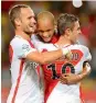  ?? AFP ?? Monaco’s Brazilian defender Fabinho (centre) celebrates with teammates after scoring a goal against PSG on Sunday. —