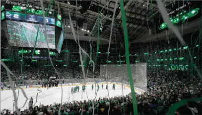  ?? ?? The Associated Press
Streamers fall from the top of the arena as the Dallas Stars celebrate their 2-1 win against the Seattle Kraken in Game 7 of their Stanley Cup second-round playoff series, Monday in Dallas.