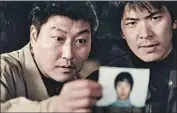  ?? CJ Entertainm­ent / Sidus / Kobal / Shuttersto­ck ?? BONG’S 2003 film “Memories of Murder,” about a killer, features Song, left, and Kim Sang Kyung.