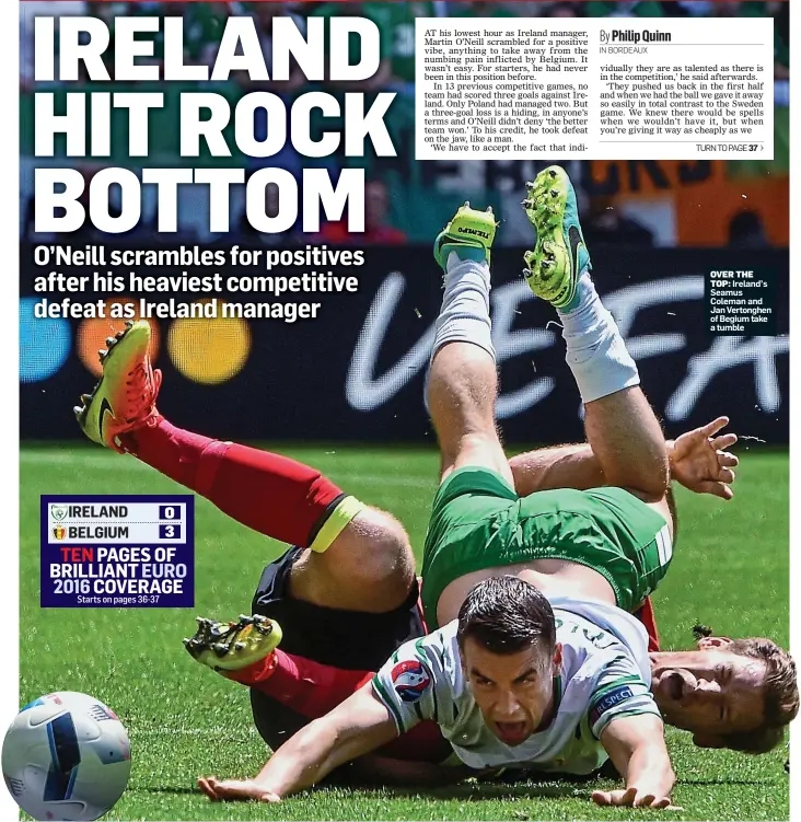  ??  ?? OVER THE TOP: Ireland’s Seamus Coleman and Jan Vertonghen of Begium take a tumble