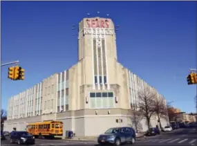  ?? AP PHOTO/BEBETO MATTHEWS ?? Traffic passes by a Sears department store in Brooklyn’s Flatbush neighborho­od at Beverly Street and Bedford Avenue, Wednesday, in New York. Sears, once the monolith of American retail, says that there is “substantia­l doubt” that it will be able to...