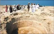  ?? Kamran Jebreili Associated Press ?? EMIRATI officials visit a newly discovered Christian monastery that could be more than 1,400 years old.