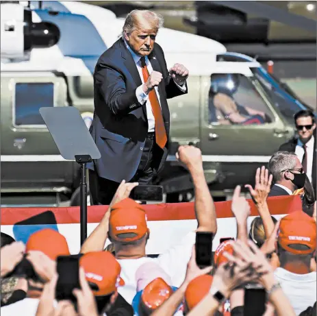  ?? MATT YORK/AP ?? President Donald Trump is cheered by supporters after speaking at a campaign rally Monday in Prescott, Arizona.