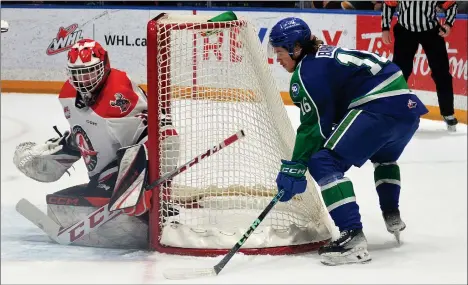  ?? STEVEN MAH/SOUTHWEST BOOSTER ?? Swift Current Broncos forward Brady Birnie tried to jam home a puck on Jackson Unger during game four on April 17.