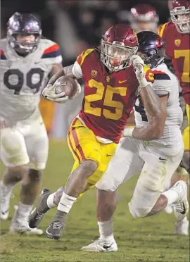  ?? Mark J. Terrill Associated Press ?? RONALD JONES II was “feeling it” against Arizona, according to USC offensive coordinato­r Tee Martin, when he ran for 194 yards in a career-high 27 carries.