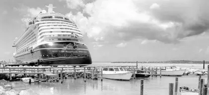  ?? GETTY ?? The Fantasy is docked in March 2012 at Disney’s Castaway Cay in the Bahamas.