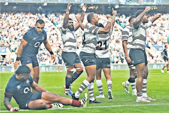  ?? ?? Low point: Fiji enjoy their first win over England in August; Ellis Genge (inset) could start against Wales