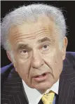  ?? AP PHOTO ?? DIFFERENCE OF OPINION: Carl Icahn said he stepped down because of ‘partisan bickering,’ but a New Yorker article implied otherwise.