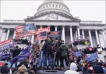  ?? Kent Nishimura/Los Angeles Times/TNS) ?? Protesters gather in front of the Capitol building Wednesday fueled by President Donald Trump unfounded claims of election fraud.