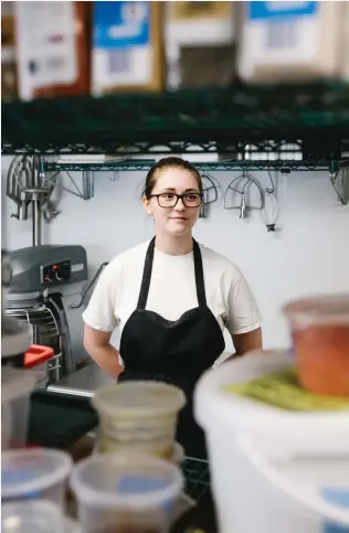  ??  ?? Adrielle Szerbat works as a profession­al bakery sous-chef, thanks to skills she acquired at Milwaukee Area
Technical College starting when she was in high school.