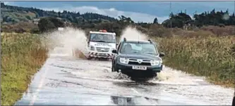  ??  ?? A816 near Lochgilphe­ad between Meadows and Cairnbaan was flooded.