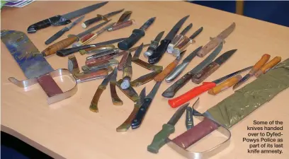  ??  ?? Some of the knives handed over to DyfedPowys Police as part of its last knife amnesty.