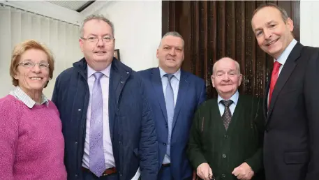  ?? Photo by Sheila Fitzgerald. ?? During his visit to Boherbue last week, Fianna Fáil Leader Micheál Martin popped in to say hello to Louis and Anne McCarthy. Also included are Michael Moynihan TD and Councillor Bernard Moynihan.