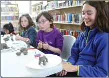  ??  ?? Children enjoying themselves at an EDIC Arts and Crafts Workshop was held in Central Library last week.