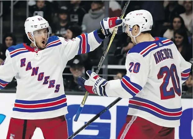  ?? — AP PHOTO ?? Former Rangers centre Ryan Spooner celebrates a goal against the Kings in Los Angeles last month. Spooner was traded to the Edmonton Oilers on Friday for Ryan Strome. In his first game with Edmonton Saturday, he played alongside Ryan Nugent-Hopkins and Ty Rattie.