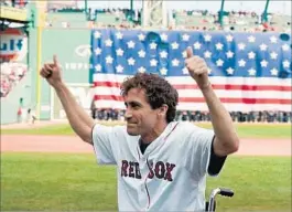  ?? Lionsgate Roadside Attraction­s ?? GYLLENHAAL as Bauman re-creates the latter’s real-life appearance at Fenway Park in Boston to throw out the first pitch in the new film “Stronger.”