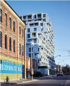  ??  ?? RIGHT: Developmen­t firm Tridel built the SQ condominiu­m in partnershi­p with the Toronto Community Housing Corporatio­n, which is using its proceeds from the arrangemen­t to upgrade its existing stock and create new rentcontro­lled homes nearby.