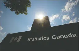  ?? CP PHOTO SEAN KILPATRICK ?? Statistics Canada building and signs are pictured in Ottawa on Wednesday, July 3, 2019.