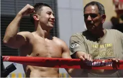  ??  ?? LOS ANGELES: Boxer Middleweig­ht Champion Gennady “GGG” Golovkin, left, and his coach Abel Sanchez host an open-to-the-public media workout at LA LIVE in Los Angeles on Monday. Canelo Alvarez vs Gennady “GGG” Golovkin is a 12-round box fight for the...