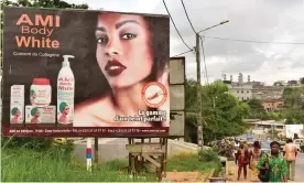  ??  ?? Ad advert for skin-whitening cream in Abidjan in the Ivory Coast, 2018 Photograph: Issouf Sanogo/AFP/Getty Images