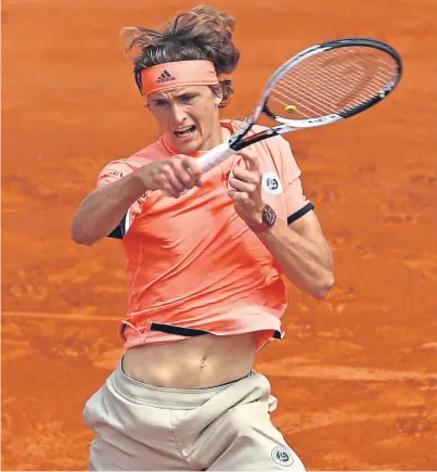  ?? Pictures: Getty. ?? Left: Novak Djokovic on route to victory against Fernando Verdasco. Above: Alexander Zverev plays a forehand during the men’s singles fourth round match against Karen Khachanov.