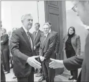  ?? Andrew Harnik Associated Press ?? JEROME POWELL greets members of the audience after being sworn in as Fed chairman Monday.