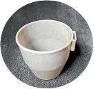  ??  ?? This cup that Logan Williams uses has been made of Keravos, a combinatio­n of PLA from corn starch and strong wool.