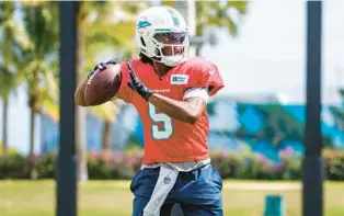  ?? DAVID SANTIAGO/AP ?? Dolphins quarterbac­k Teddy Bridgewate­r during practice at Baptist Health Training Complex in Hard Rock Stadium on Thursday in Miami Gardens.