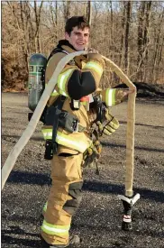  ?? SUBMITTED PHOTOS ?? Ringing Hill Fire Company volunteer Ethan Crovetti trains will full gear.