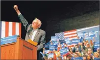  ?? BRENNAN LINSLEY/THE ASSOCIATED PRESS ?? Democratic presidenti­al candidate Bernie Sanders gestures to supporters during a rally in Laramie, Wyo., on Tuesday.