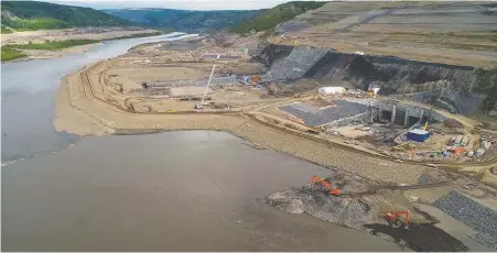  ?? B. C. HYDRO ?? Originally estimated to cost $6 billion, the Site C hydroelect­ric project's price tag was revised to $10.7 billion last March, at which time $5 billion had already been spent. A review of the project is expected from engineer and former deputy finance minister Peter Milburn by early December